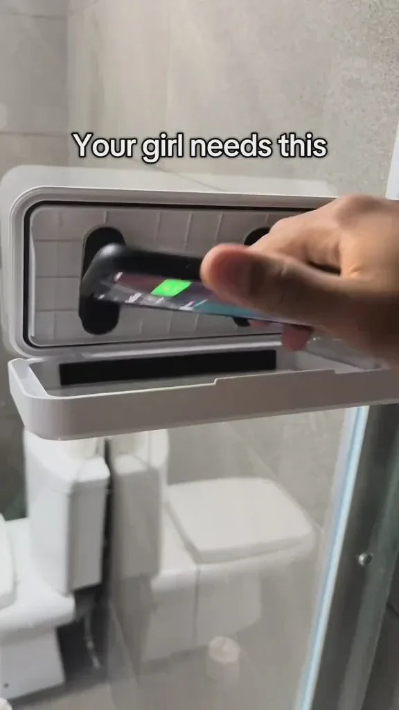 A person placing a phone into the real white shower case through its open hinged lid